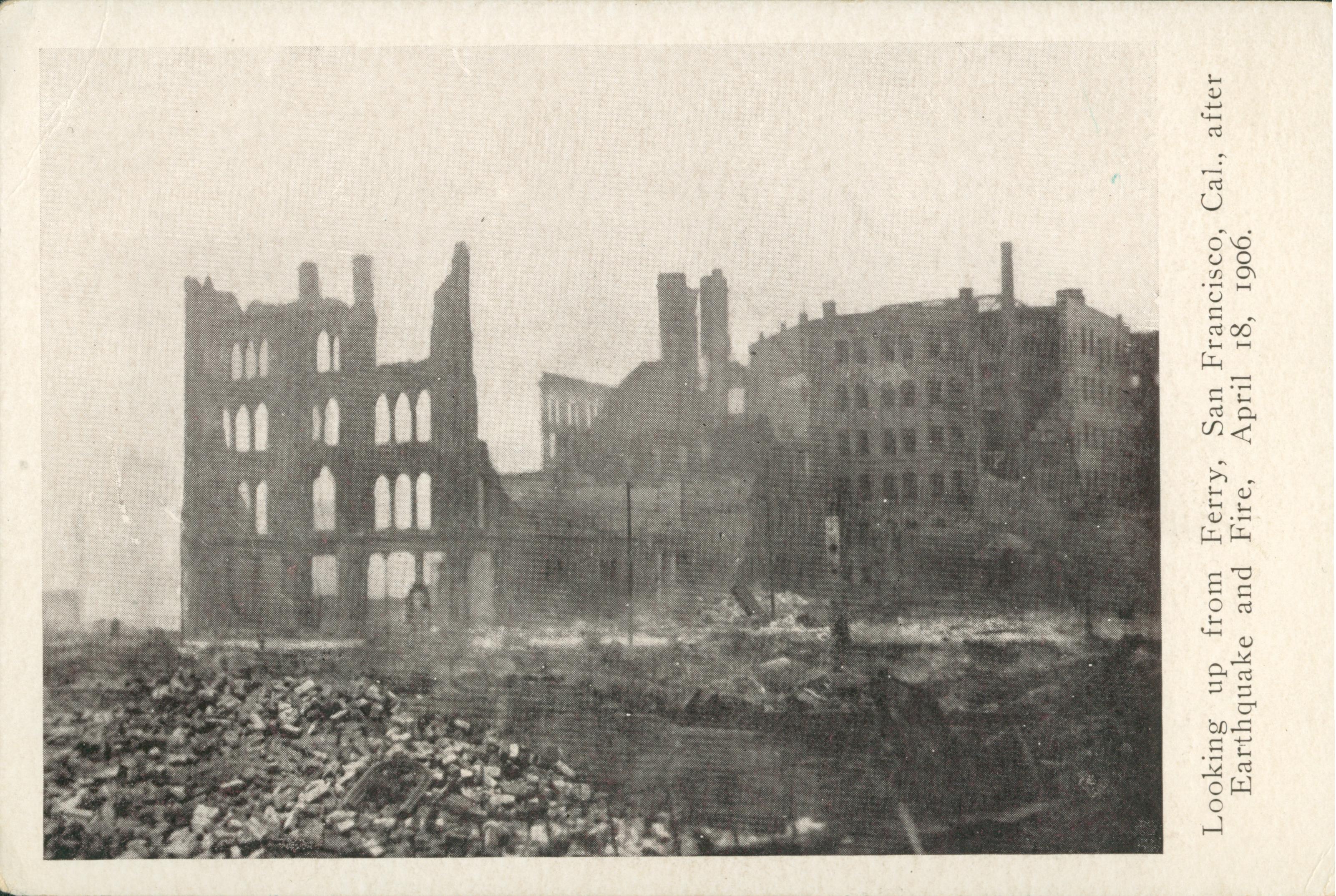 Shows several destroyed buildings surrounded by rubble.