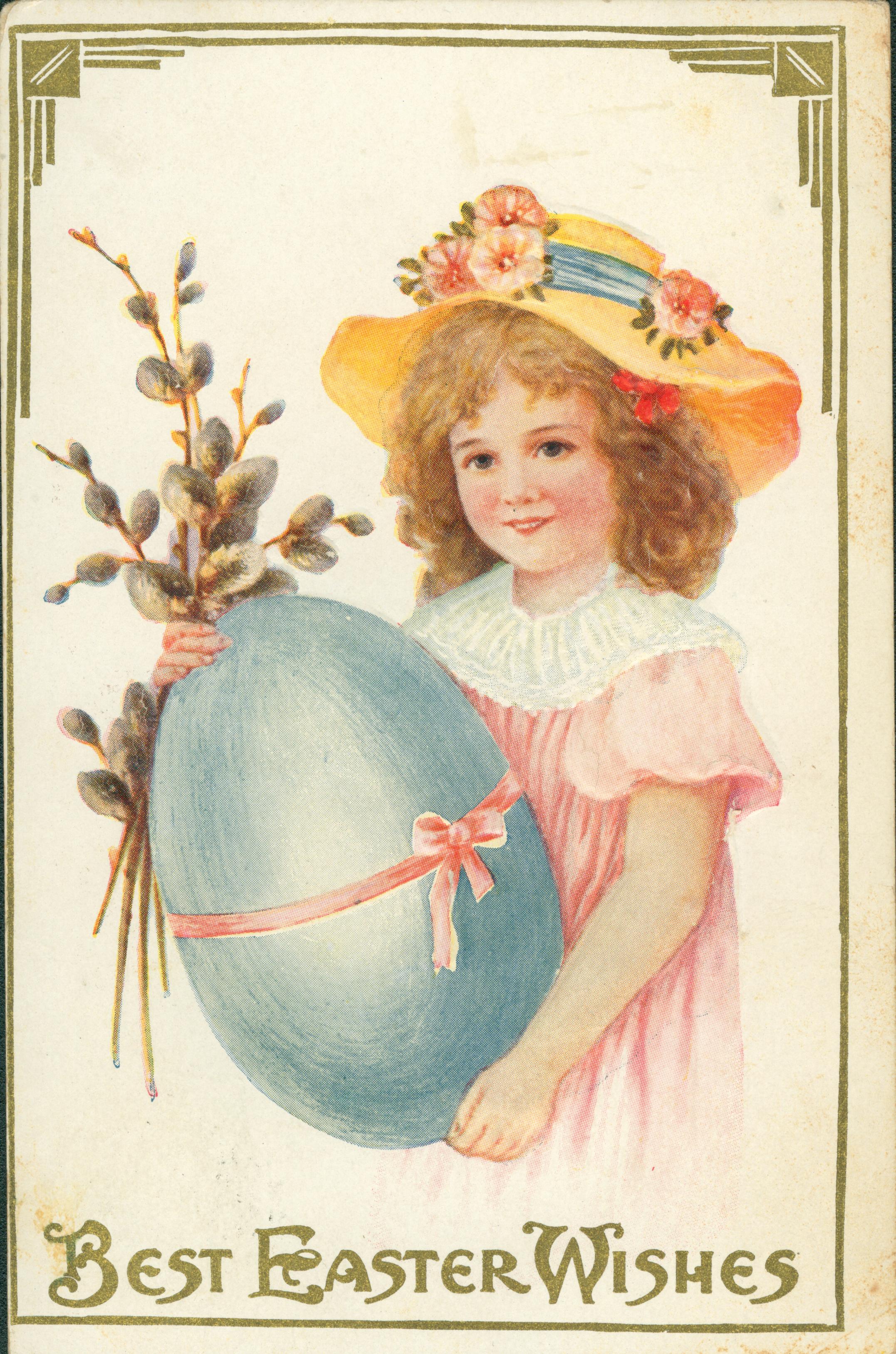 A young girl holding a large blue egg and some flowers.