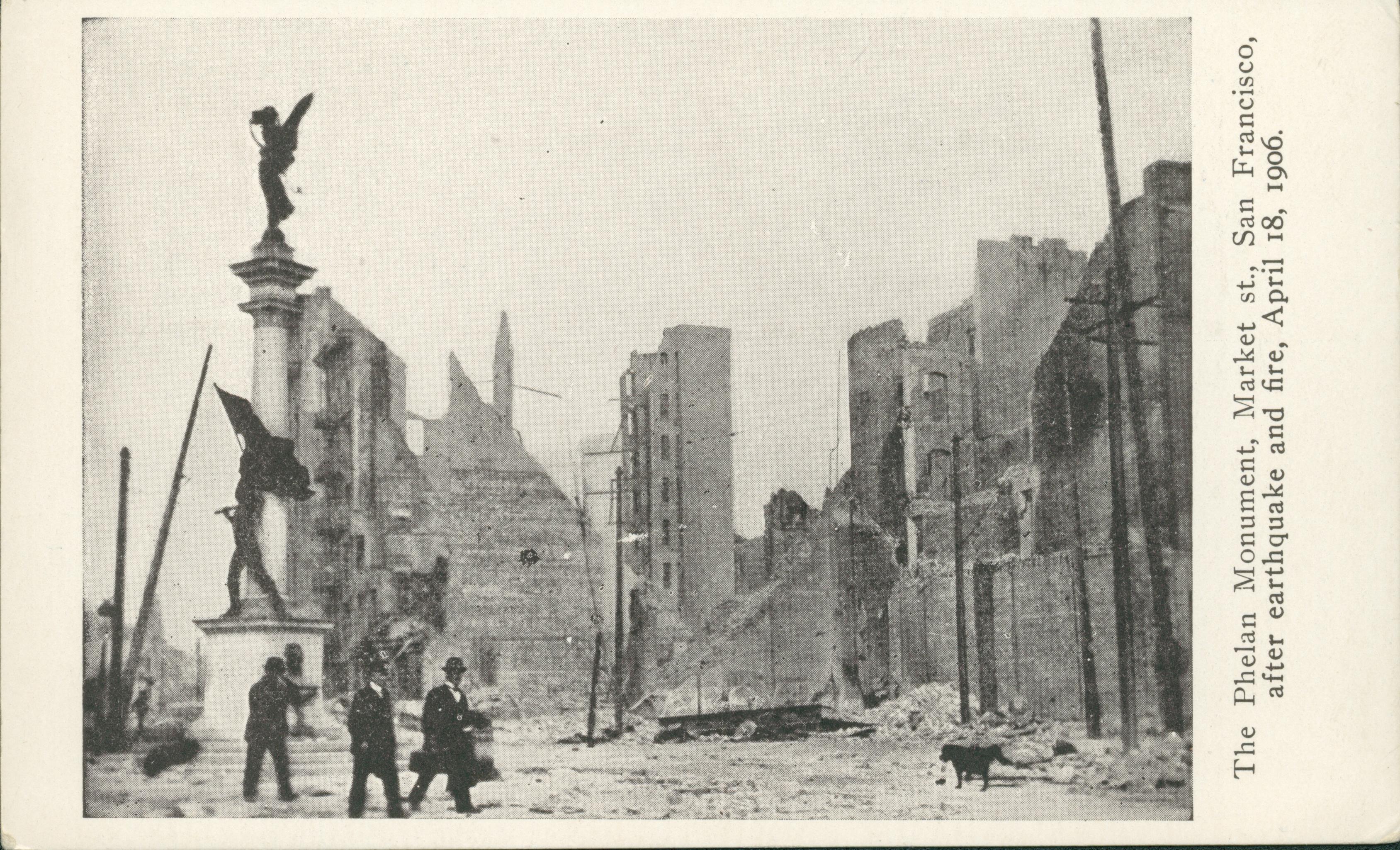 Shows the Phelan Monument standing with multiple collapsed buildings in the background.