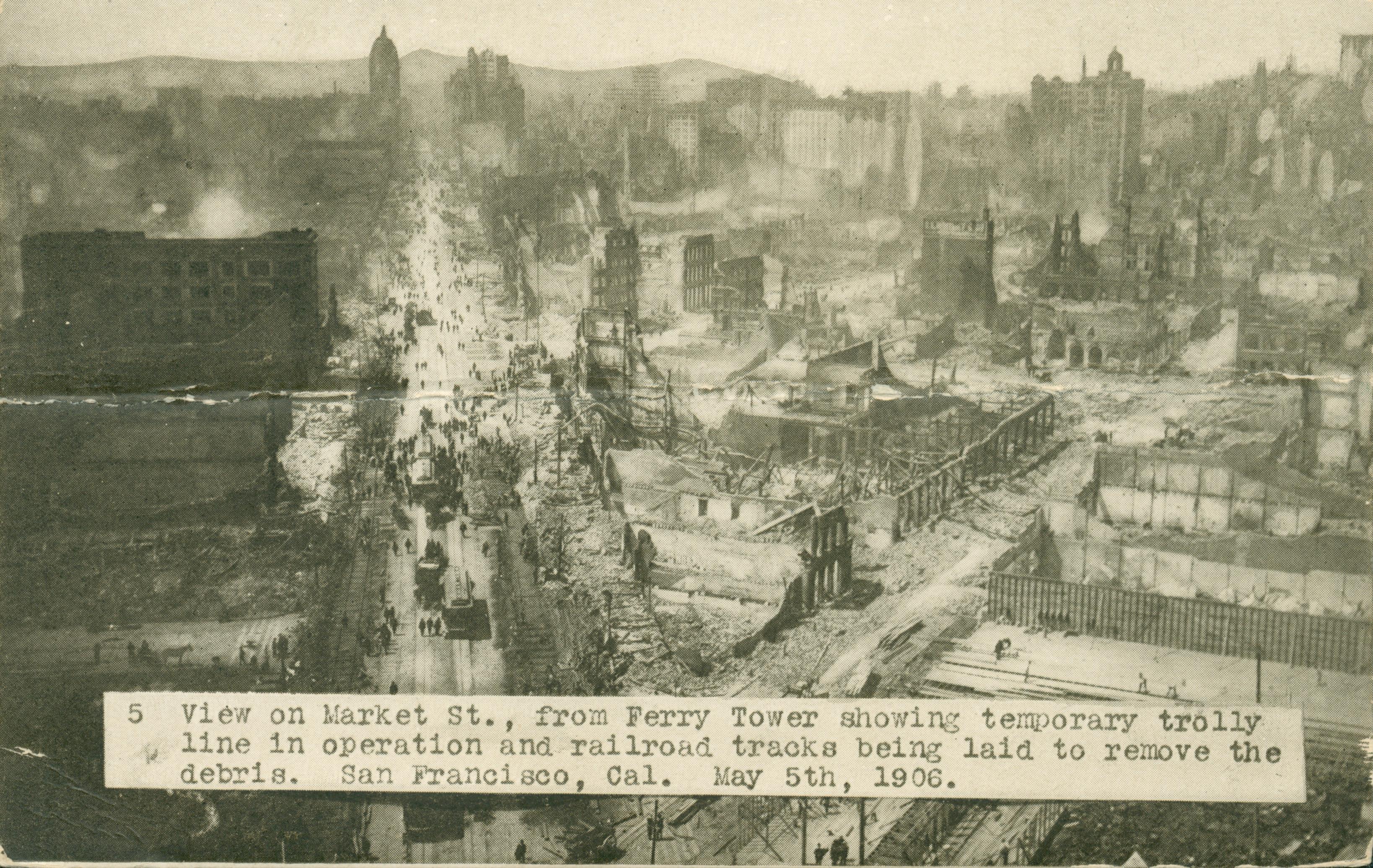 Shows an birds-eye view of the destruction around Market Street, San Francisco, California.