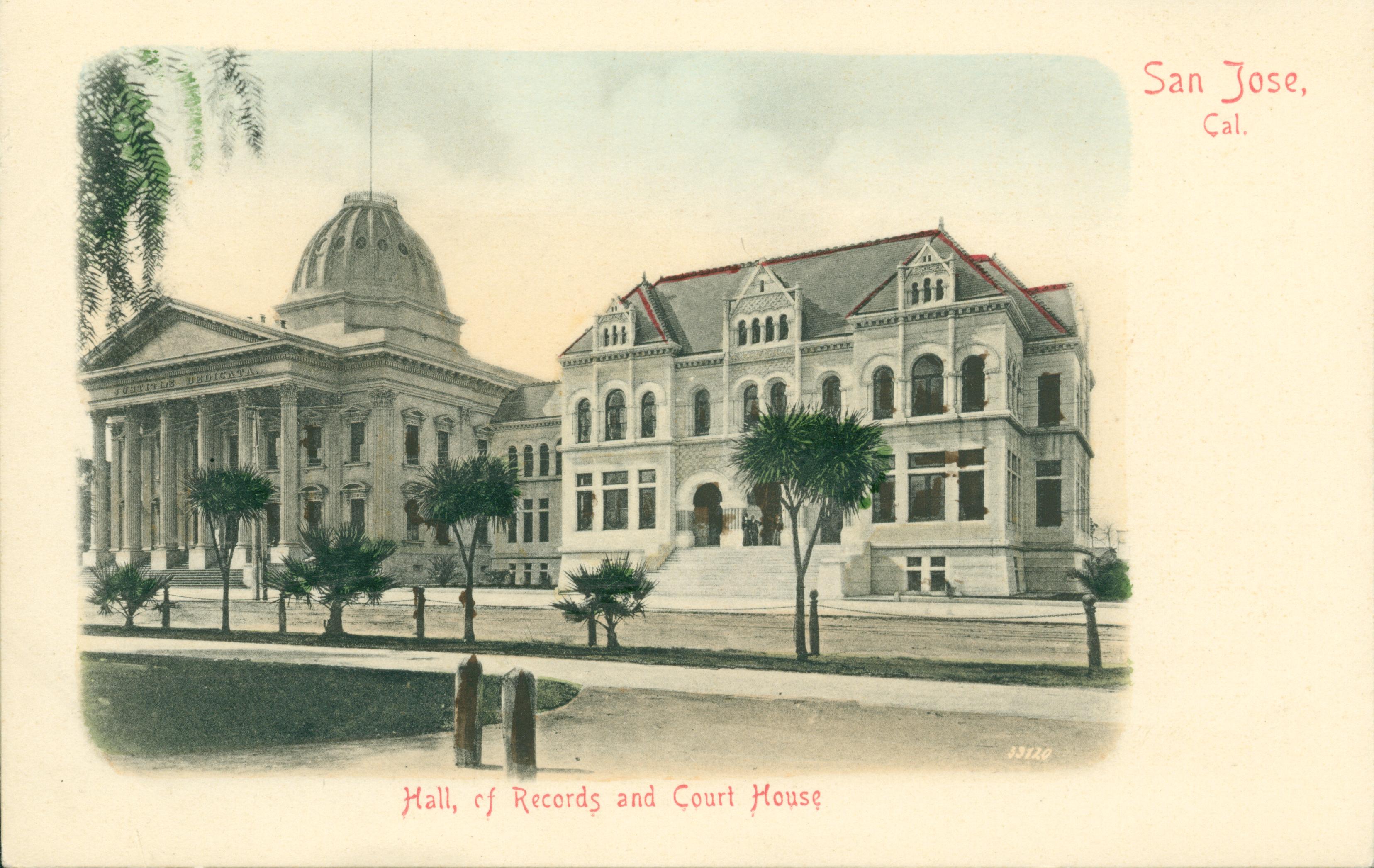 Exterior view of Court House and Hall of Records, palm trees