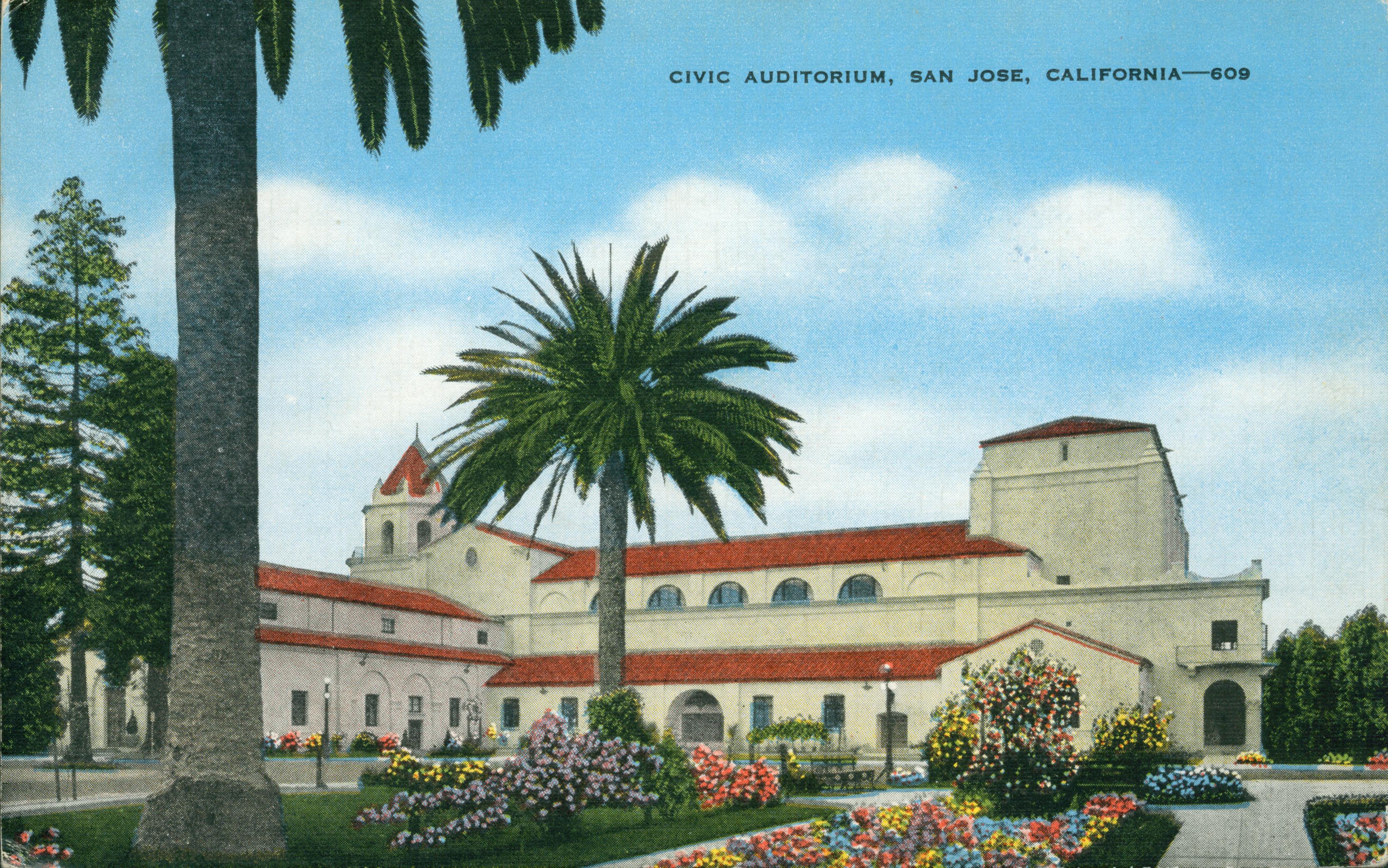 Exterior view of the Civic Auditorium and surrounding gardens and flowers