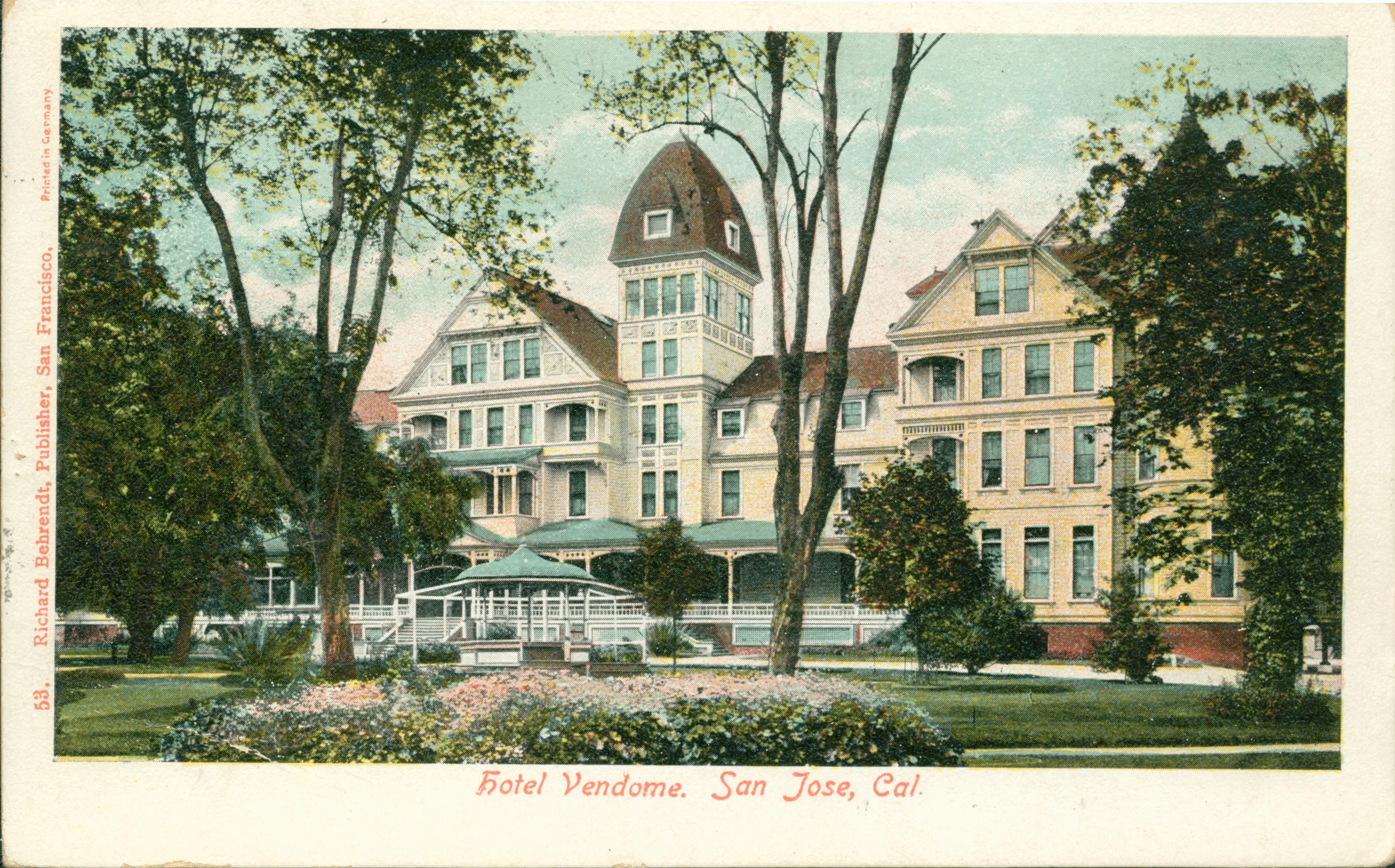 Colorful scene of the Hotel Vendome, road in front of hotel with gardens and trees