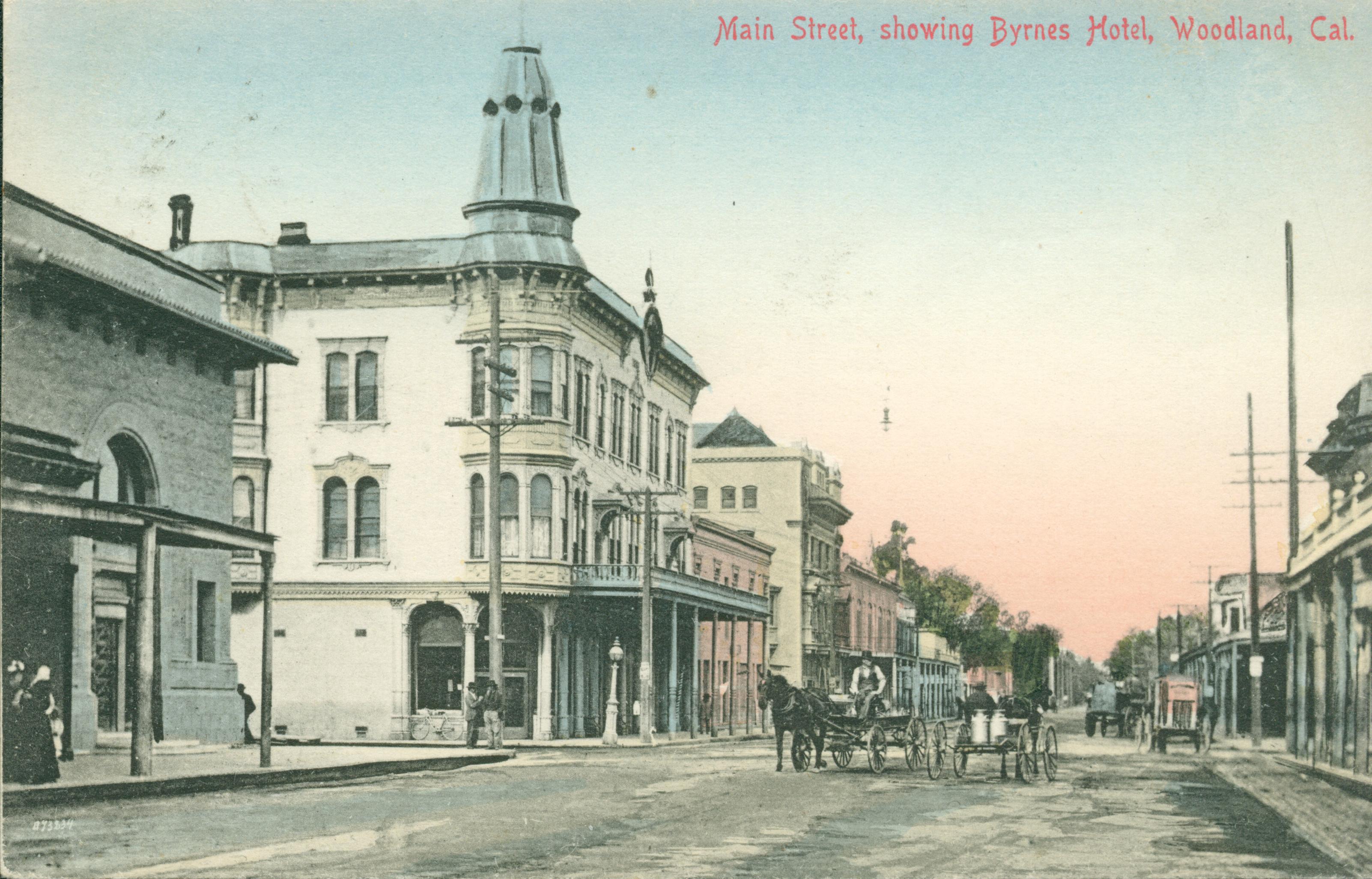 Shows Main Street in Woodland with the Byrnes Hotel on the left