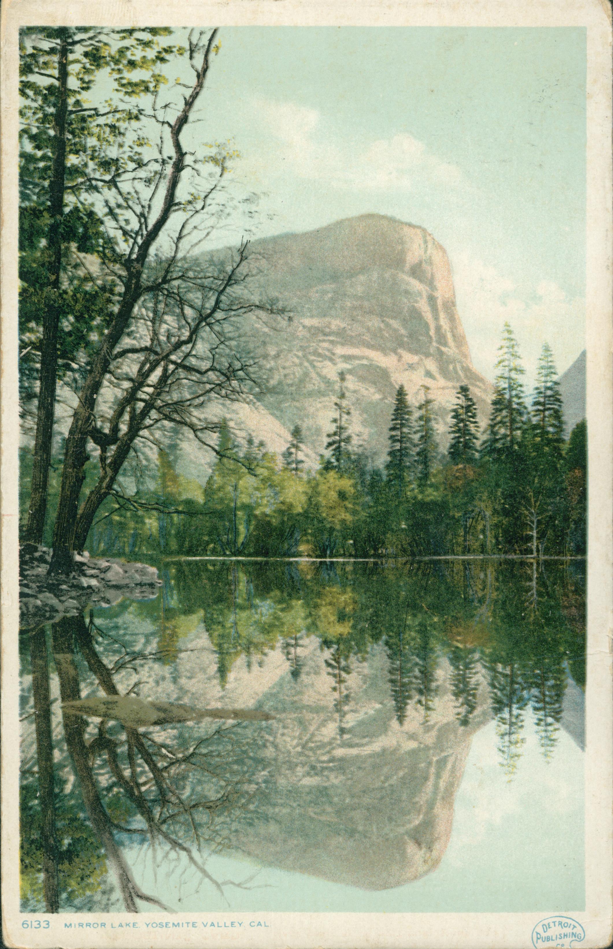 Shows Mirror Lake with a rock formation in the background