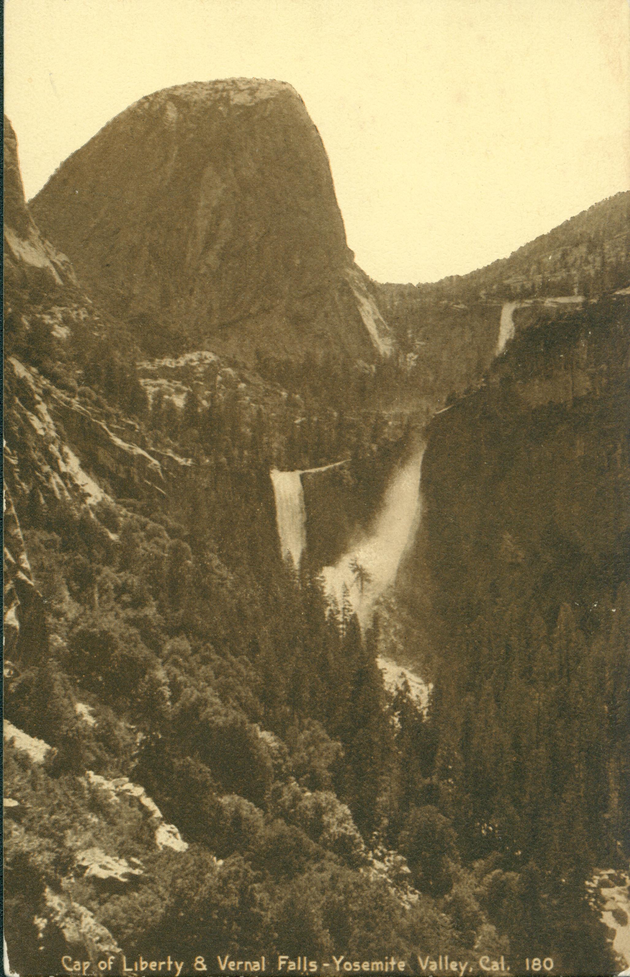Shows a view of Vernal Falls with the Cap of Liberty on the left