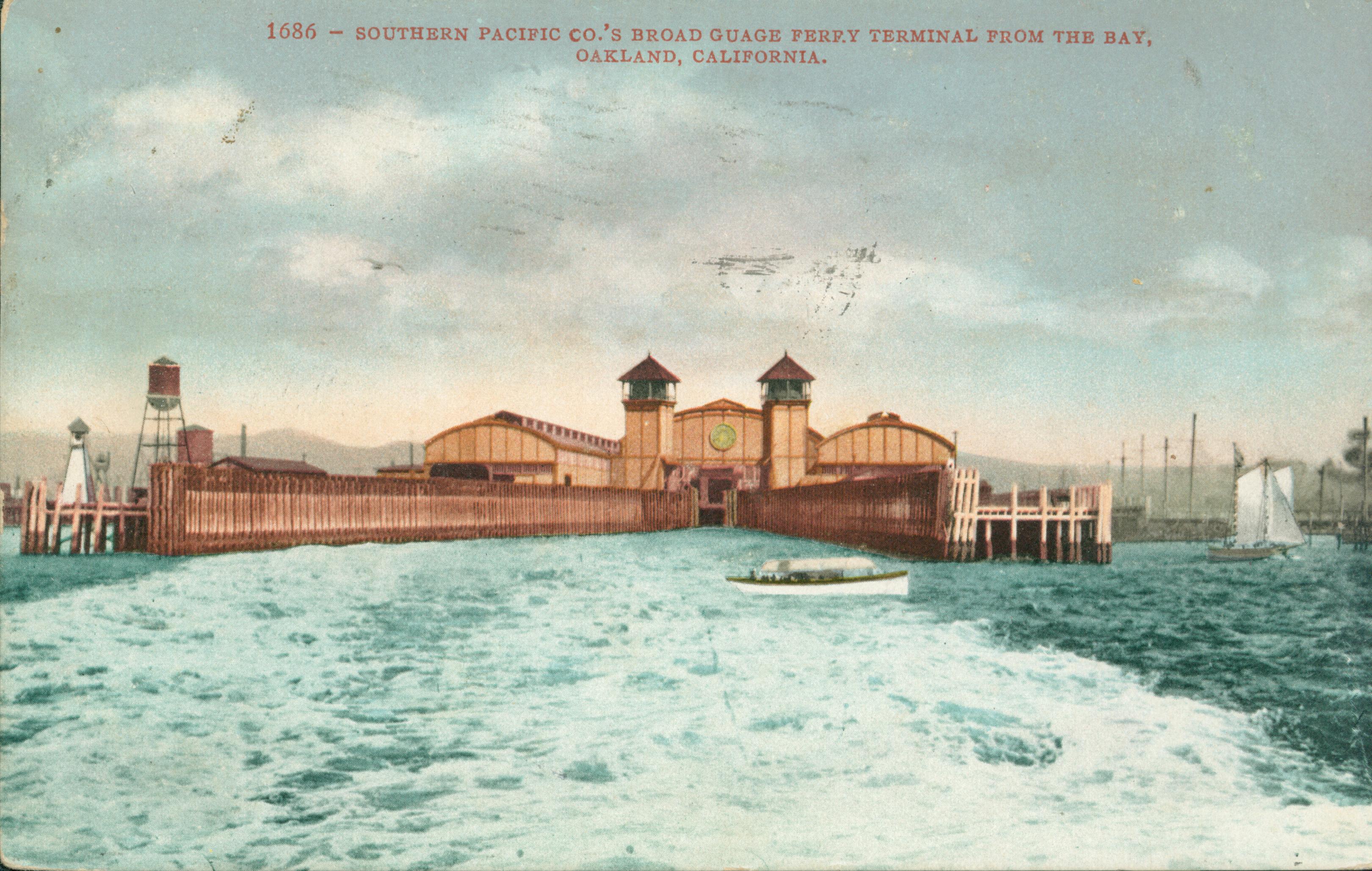 Shows the water view of the ferry terminal for the Southern Pacific train ferries
