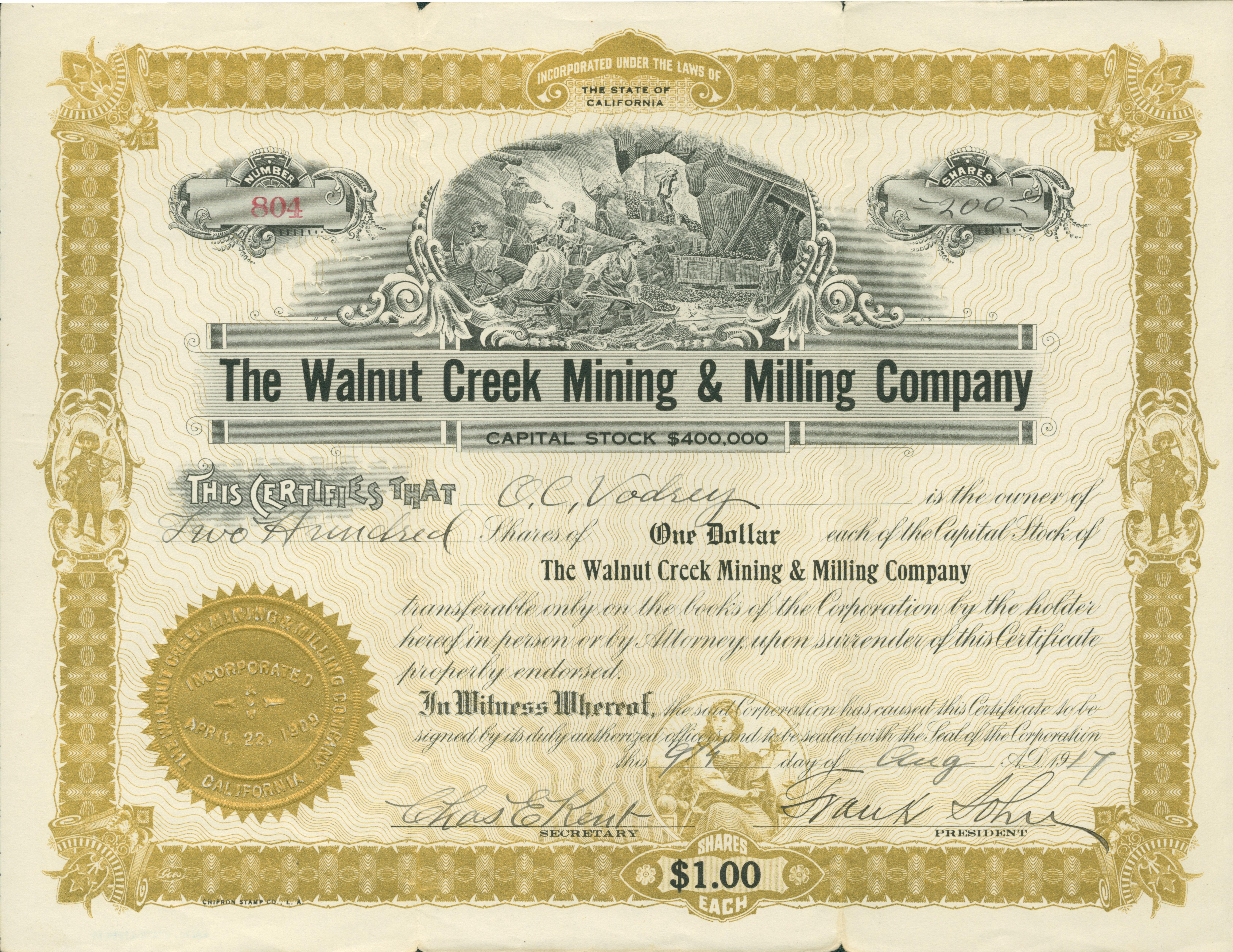Front of the first certificate contains an engraving of several men working in a hard-rock mine