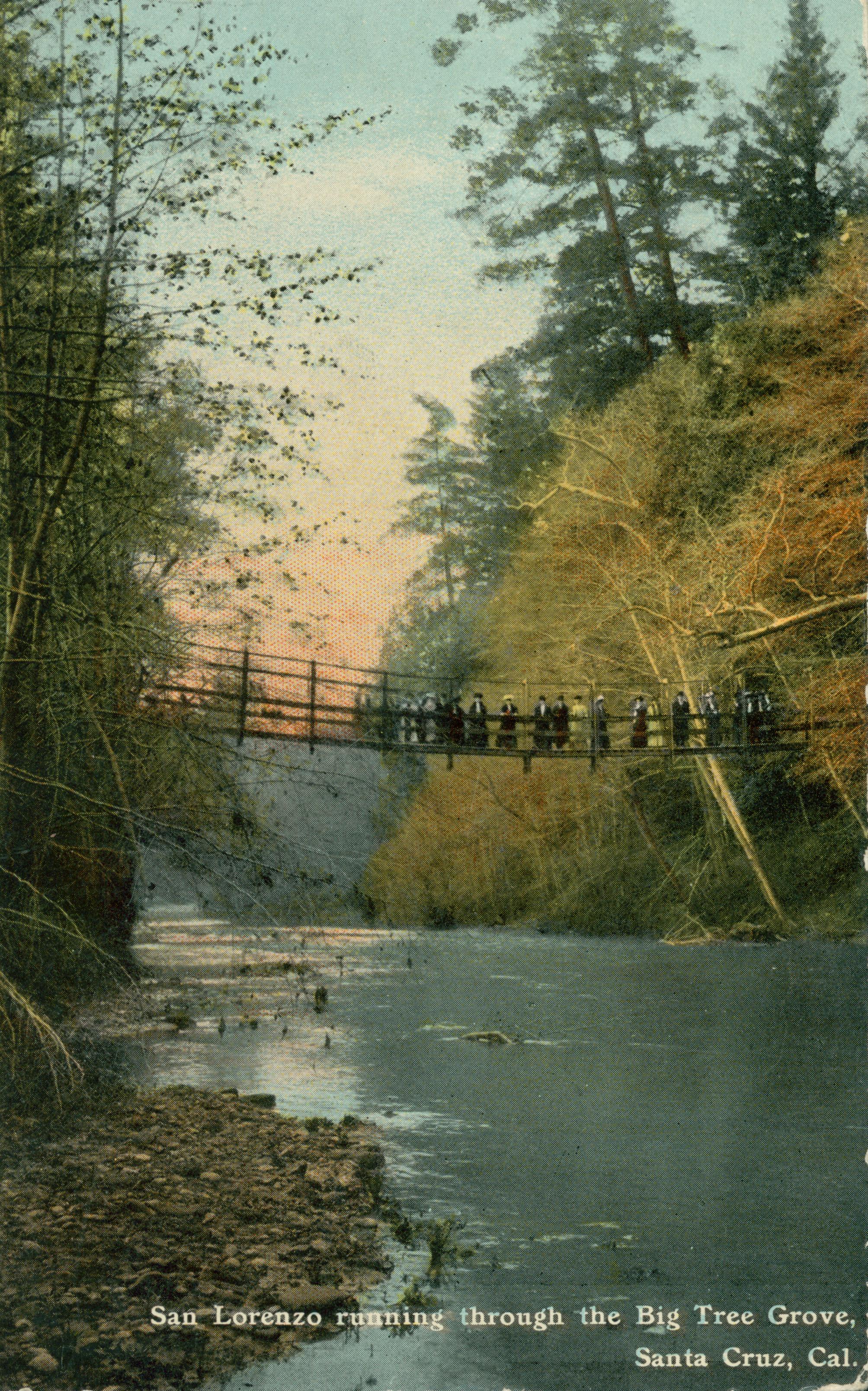 Shows a bridge over a river with several people standing on it.