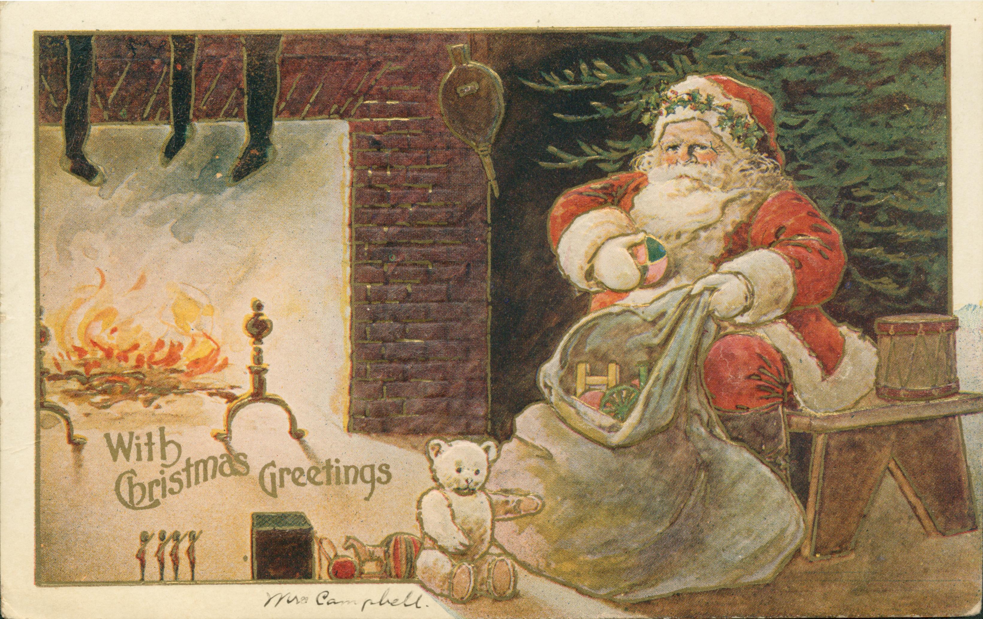 Shows Santa Claus unpacking gifts in front of a fireplace and a Christmas Tree